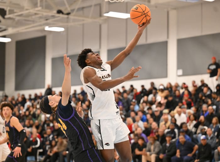 Salesian's Carlton Perrilliat swoops in for two in regional championship win over Riordan